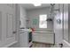 Well-organized laundry room with modern appliances, counter space, and convenient storage solutions for efficient chores at 7915 115Th E Ave, Parrish, FL 34219
