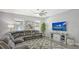 Open living area with cozy seating, neutral color palette, and plenty of space for relaxation at 7915 115Th E Ave, Parrish, FL 34219