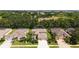 Aerial view of home featuring lush backyard, screened in patio and gorgeous golf course community at 7915 Kavanagh Ct, Sarasota, FL 34240
