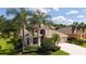 Beautiful home with well-maintained landscaping and mature trees at 7915 Kavanagh Ct, Sarasota, FL 34240