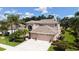 Beautiful home with manicured lawn and lush landscaping at 7915 Kavanagh Ct, Sarasota, FL 34240