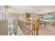 Upstairs game room boasts a pool table, wet bar, and natural light from the window at 7915 Kavanagh Ct, Sarasota, FL 34240