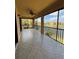 Large screened-in balcony offers stunning water views and ample space for outdoor living at 10054 Crooked Creek Dr # 201, Venice, FL 34293