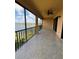 Large screened-in balcony offers stunning water views and ample space for outdoor living at 10054 Crooked Creek Dr # 201, Venice, FL 34293
