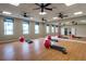 Community fitness center with free weights and mirrored wall at 10054 Crooked Creek Dr # 201, Venice, FL 34293