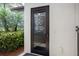 Exterior door into the U-Topia Spa at Sarasota National at 10054 Crooked Creek Dr # 201, Venice, FL 34293