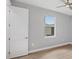 Bedroom featuring a ceiling fan and a double paned window at 10443 Riverside Rd, Port Charlotte, FL 33981