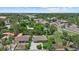 Beautiful aerial view showcases a peaceful neighborhood with green trees and quiet streets in Sarasota, Florida at 1051 Indian Beach Dr, Sarasota, FL 34234