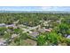 A scenic aerial shot captures the coastline of Sarasota, Florida, with lush greenery and beautiful water views at 1051 Indian Beach Dr, Sarasota, FL 34234