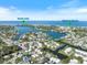 Beautiful aerial view of 107 Clipper Way, with canal access to North Jetty and Nokomis Beach at 107 Clipper Way # 107, Nokomis, FL 34275
