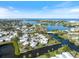 Beautiful aerial view of a waterfront community with canals and access to the ocean on a clear, sunny day at 107 Clipper Way # 107, Nokomis, FL 34275