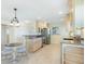 Updated kitchen with granite counters, stainless appliances and tile flooring at 107 Clipper Way # 107, Nokomis, FL 34275