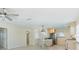 A view of the updated kitchen and dining area that features tile flooring at 107 Clipper Way # 107, Nokomis, FL 34275