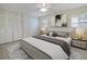 Spacious main bedroom with a large closet and decorative accents at 107 Clipper Way # 107, Nokomis, FL 34275