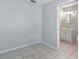 Bright bathroom with tile flooring, white vanity, and great natural light; perfect for getting ready in the morning at 111 66Th Street E Ct, Bradenton, FL 34208