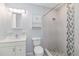 Bathroom with modern fixtures, tiled shower, and vanity at 111 66Th Street E Ct, Bradenton, FL 34208