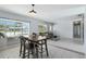 Inviting living space with a dining table, large windows, and stylish decor, perfect for gatherings at 111 66Th Street E Ct, Bradenton, FL 34208