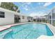 Sparkling screened-in pool, complemented by a patio area that's ideal for entertaining and relaxing outdoors at 111 66Th Street E Ct, Bradenton, FL 34208