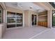 Backyard lanai with kitchenette and lake views at 11328 Rivers Bluff Cir, Lakewood Ranch, FL 34202