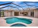 Relaxing screened-in pool and patio area is perfect for entertaining with multiple sliding doors for easy access at 11328 Rivers Bluff Cir, Lakewood Ranch, FL 34202