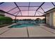 Relaxing screened-in pool and spa overlooking a tranquil lake at 11328 Rivers Bluff Cir, Lakewood Ranch, FL 34202
