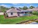A beautiful pool and outdoor patio with dark metal enclosure at 11328 Rivers Bluff Cir, Lakewood Ranch, FL 34202