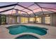 Screened-in pool and patio enhance the home's appeal, perfect for relaxation and entertaining under vibrant skies at 11328 Rivers Bluff Cir, Lakewood Ranch, FL 34202