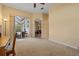 Bedroom featuring a sliding glass door to the patio at 11508 30Th E Cv, Parrish, FL 34219