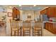 Kitchen with wooden cabinets and a breakfast bar at 11508 30Th E Cv, Parrish, FL 34219