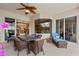Spacious covered patio with ample seating and a view of the backyard at 11508 30Th E Cv, Parrish, FL 34219