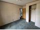 Spacious bedroom with carpet and walk-in closet at 13023 Taylor St, Brooksville, FL 34613