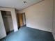 Bedroom view with carpet floors and closet at 13023 Taylor St, Brooksville, FL 34613