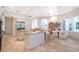 Spacious kitchen with granite counters, stainless steel appliances, and decorative cabinets at 13203 Lost Key Pl, Lakewood Ranch, FL 34202