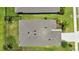A high angle of a well-maintained property featuring a manicured lawn and neat landscaping at 13804 Woodbridge Ter, Lakewood Ranch, FL 34211