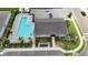 An aerial photograph of the community pool with ample seating and well-manicured landscaping at 13804 Woodbridge Ter, Lakewood Ranch, FL 34211