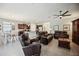 Spacious living room with tile flooring flowing into kitchen and dining area at 13804 Woodbridge Ter, Lakewood Ranch, FL 34211
