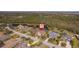 A beautiful aerial view of the neighborhood with lush greenery, bodies of water, and pristine landscaping at 14901 17Th E Ave, Bradenton, FL 34212