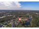 An aerial view of the neighborhood featuring lush greenery, lakes, and well-maintained homes at 14901 17Th E Ave, Bradenton, FL 34212