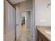 Bathroom featuring granite counters and shower with tile surround at 14901 17Th E Ave, Bradenton, FL 34212