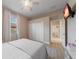 Bright bedroom features a large closet and a mounted television at 14901 17Th E Ave, Bradenton, FL 34212