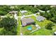 Aerial view of a home with pool and fenced in backyard at 1498 Truval Ter, Port Charlotte, FL 33952