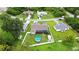 Aerial view of a home with pool and fenced in backyard at 1498 Truval Ter, Port Charlotte, FL 33952