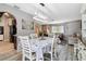 Welcoming dining area features hardwood floors and an open layout that leads into the living room at 1498 Truval Ter, Port Charlotte, FL 33952