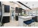 Bright kitchen features an island with seating, updated cabinets, and decorative backsplash at 1498 Truval Ter, Port Charlotte, FL 33952