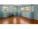 Bedroom with natural light, hardwood floors and large windows at 1541 Flower Dr, Sarasota, FL 34239