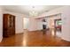 This formal living room has hardwood floors, a fireplace, and an elegant chandelier at 1541 Flower Dr, Sarasota, FL 34239