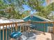 Inviting balcony featuring a table and chairs, ideal for enjoying outdoor relaxation at 1732 6Th St, Sarasota, FL 34236