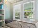 Cozy bedroom nook with a built-in bed underneath a bright window, offering relaxing views at 1732 6Th St, Sarasota, FL 34236