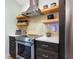 Modern kitchen with stainless steel appliances, subway tile backsplash, and ample counter space at 1732 6Th St, Sarasota, FL 34236