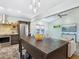 Modern kitchen featuring an island, stainless steel appliances, and a breakfast bar at 1732 6Th St, Sarasota, FL 34236